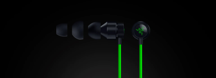 Black Razer in-ear headphones with green cables, a circular Razer logo on the earbud, and an adjustable ear tip.