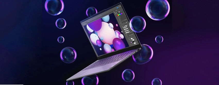 Luna Grey Yoga Slim 7i Gen 9 laptop floating with bubbles in the background