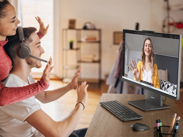 People video chatting on Luna Grey IdeaCentre AIO i Gen 9 computer